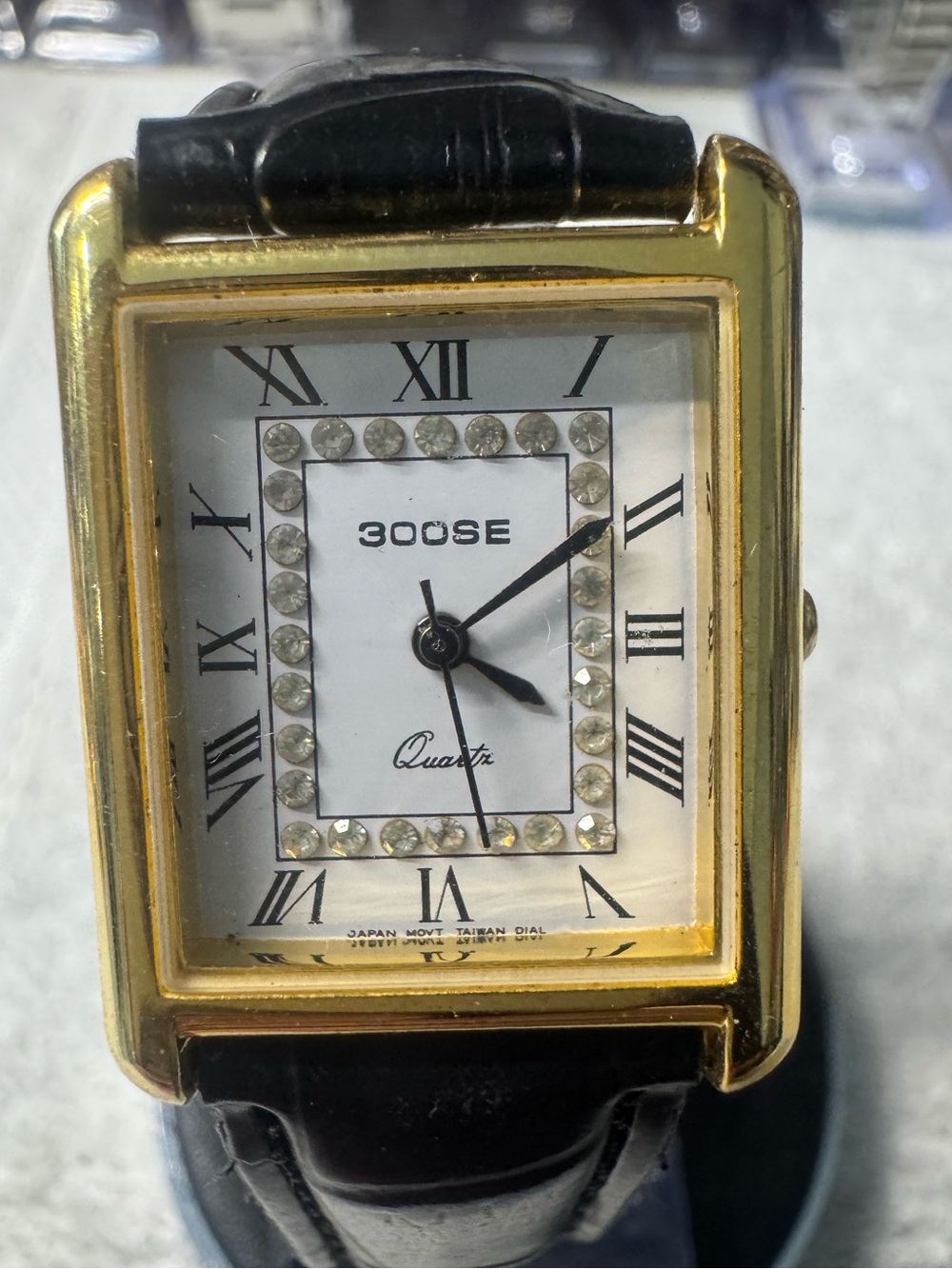 Gold-Tone Rectangular Quartz Watch with Black Leather Strap